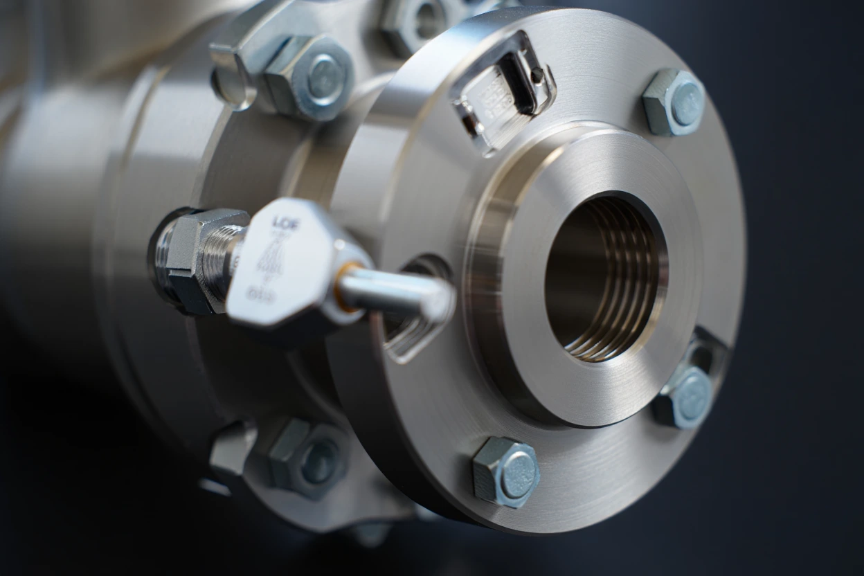 Macro detail of orifice flange union pressure tap and bolts